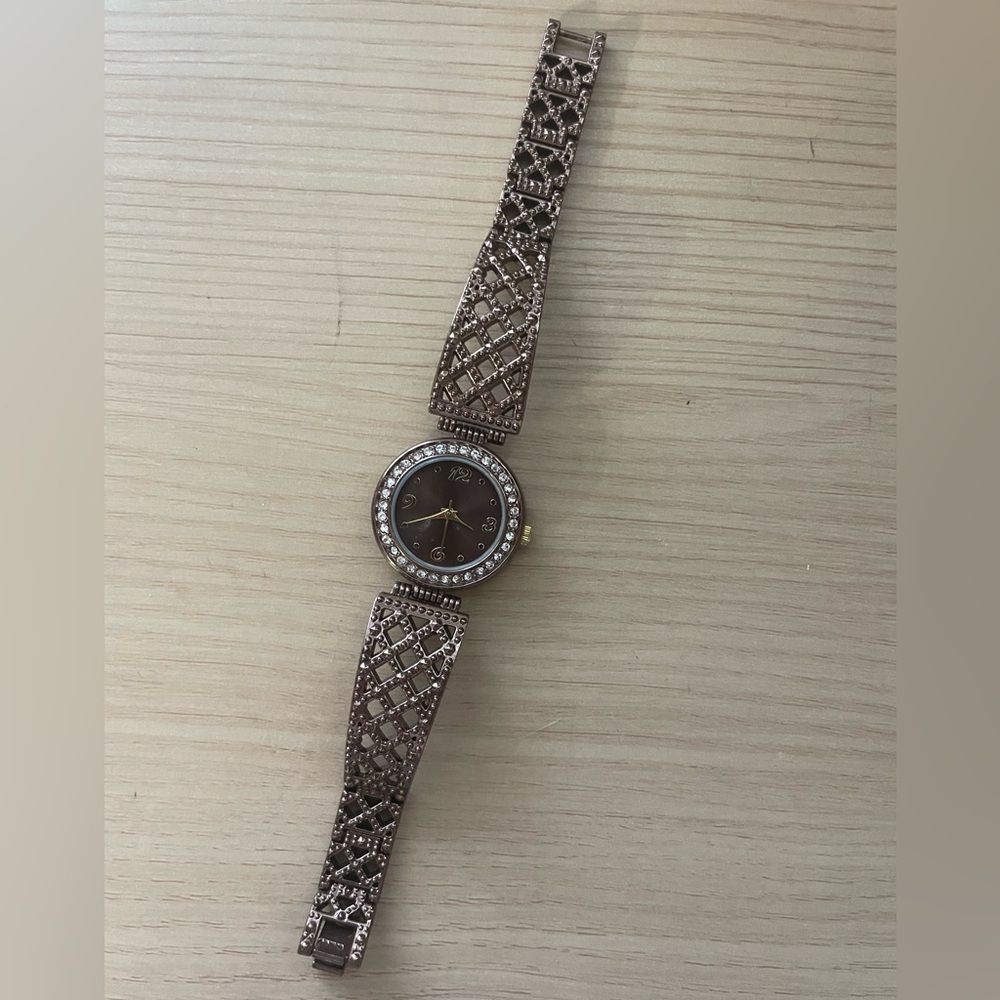 brown/bronze watch with rhinestones